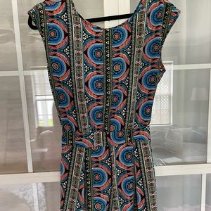 Beautifully patterned Romper with open back